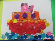 a child's drawing of a cake with gummy bears on it