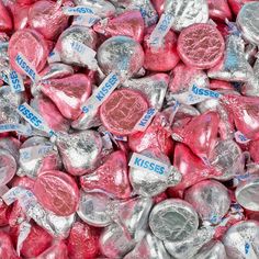 many pink and silver heart shaped candy candies