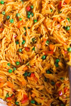 rice with peas and carrots in a bowl