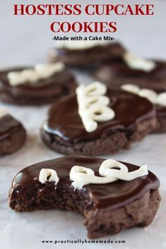 chocolate cookies with white frosting on top and the words hostess cupcake cookies written in large letters