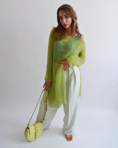 Hello, I'm the one, who won't let you down - lime green mohair tunic.I will comfort you, keep you warm and will make you smile. I'm 100% hand made and proud of that. I consist of 70% italian kid mohair and 30% of nylon, which makes me incredibly natural. I'm quite unique as could be worn all year long.I'm in one size and one size fits all because my measurements are :❤️   Width -50 cm❤️   Lengths -86 cmIf you would like me in other size, you could request a custom order with your own parameters, Green Layering Sweater For Spring, Trendy Green Open Knit Sweater, Green Long Sleeve Summer Sweater, Oversized Asymmetrical Spring Sweater, Oversized Asymmetrical Sweater For Spring, Oversized Open Knit Green Sweater, Long Green Sweater For Fall, Oversized Green Open Knit Sweater, Oversized Green Sweater For Spring