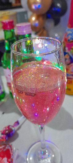 pink drink glow glitter birthday party Party Aesthetic Ideas Decoration, Birthday Drink Ideas Non Alcoholic, Party Glitter Aesthetic, Glitter Drink Aesthetic, Glitter Aesthetic Party, Pink Glitter Drink Non Alcoholic, Drink Party Aesthetic, 21st Birthday Non Alcoholic Ideas, Pink Themed Birthday Party 21