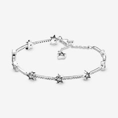 Let yourself be inspired by our magical, dreamy world based on the mystery of the night sky and the brilliance of starlight. Our star bracelet features a collection of irregularly-shaped sterling silver star shapes embellished with round cubic zirconia stones bound together by pavé bars to evoke a life beyond your wildest dreams, with each star symbolizing a past milestone or a future achievement. Let the sterling silver bracelet remind you of all of the proud moments that make you, you. - Pandora Celestial Stars Bracelet - Sterling silver / Cubic Zirconia / Clear - Sz. 7.1 in Pandora Celestial, Stars Bracelet, Pandora Star, Celestial Stars, Charms Pandora, Golden Trio, Bracelet Pandora, Pandora Charm, Star Bracelet