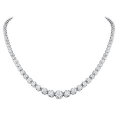 This finely made graduated necklace with beautiful round diamonds sits elegantly on any neck. Metal: 14k Gold Diamond Cut: Round Total Diamond Approx. Carats: 10ct Diamond Clarity: VS Diamond Color: F-G Size: 18 inches Color: White Gold Included with your order: Certificate of Appraisal Customized Necklace Box & Bag Customized Necklace, Diamond Tennis Necklace, Vvs Diamond, Graduation Necklace, Vs Diamond, Tennis Necklace, Necklace Box, Station Necklace, American Diamond