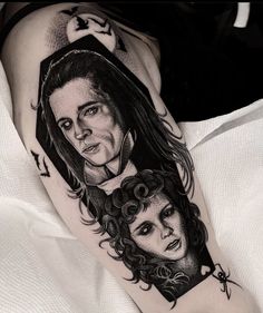 a woman's leg with an image of two women on it