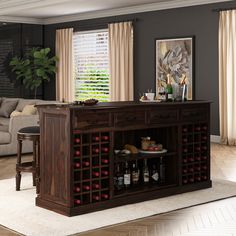 a living room filled with furniture and a wine rack on top of a wooden table