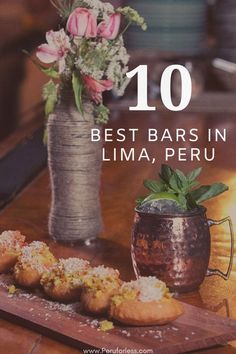 the cover of 10 best bars in lima, peru with flowers and vase on table