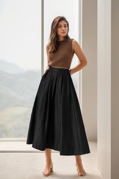 "you can wear it as a casual skirt for travelling, having a picnic with your friends, dating and shopping, Perfect for lazy days that you want to sustain a chic and stylish appearance. DETAIL * 100% linen  * Linen skirt, black Linen skirt * Organic Linen skirt * Right Side zip closure * Two side pockets * pleated waist detail * Back elastic waist, plus size skirt * Midi Linen skirt * Perfect for summer, spring, autumn MODEL SIZE Bust 85 cm(33.4\") Waist 67 cm(26.7\") Height 168cm (5' 6\") She wears size XS Choose CUSTOM Order if you * Can't find your size in our size Chart * Your Height is not Between 5'1\" - 5\"9\" * Your weight is over 80kg SIZE GUIDE Size vary between Brand and Country Please get your body measurement with our Size Guide And Find your size in our Size Chart SIZE CHART h Office Skirt Women, Black A Line Skirt Outfit Casual, A Line Black Skirt Outfit, Black Peasant Skirt Outfit, Midi Skirts Ideas, Black Skirt Outfit Ideas Summer, Daily Wear Clothes For Women, A Line Midi Skirt Outfit, Black A Line Skirt Outfit