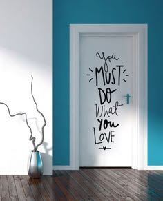 an open door with the words you must do what you love on it