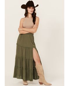 Model is 5'8" wearing a size small. Maxi length. Elastic waistband. Slit on left side. Ladder lace inset panel details. Solid green design. Dan Post Boots Woman, Justin Boots Womens, Boot Barn, Carhartt Womens, Skirts With Boots, Tiered Maxi Skirt, Solid Green, Lace Inset, Todays Outfit