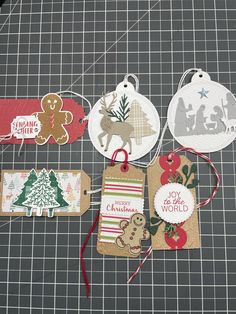 christmas tags are laid out on a table