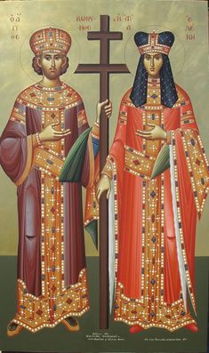 an icon with two men holding a cross and wearing red robes, standing next to each other