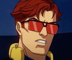 a man with red hair wearing sunglasses