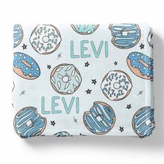 a blue and white wallet with donuts on it