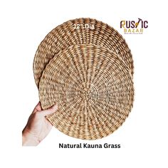 a hand holding a woven basket with the words natural kauna grass on it