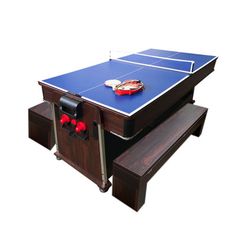 a ping pong table with two benches underneath it and a racket on top