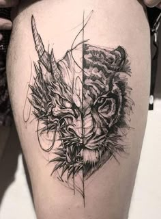 a black and white photo of a tiger's head on the side of a woman's thigh