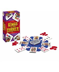 the king's corner card game is shown in front of its box and contents