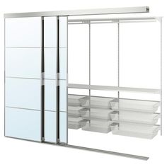 a mirrored closet with drawers and sliding doors