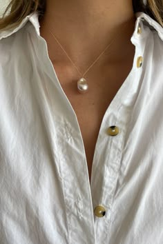 This gold and baroque pearl necklace elevates the everyday. Elegant yet casual, this necklace makes a great layering piece that you will never want to take off! Each pearl is unique, and is subject to its own perfect imperfections. Pearl measures approximately 1/2" and is affixed to an 16" 14-karat link chain with spring ring clasp. Made in the U.S.A. * This product is crafted with natural pearls, and variations make each piece unique. Item ships within 1 to 2 weeks and is excluded from ALL disc Dress With Pearl Necklace, Pearl Necklace Aesthetic, Pearl Necklace Outfit, Chunky Pearl Necklace, Necklace Outfit, Chunky Pearls, Pink Pearl Necklace, Pearl Anklet, Pearl Drop Necklace