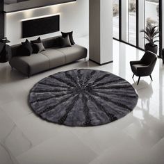 a modern living room with black and white decor