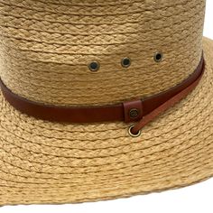 Description Introducing the Kenai straw cowboy hat! This iconic hat features a true cattlemen's crease top crown and wide upturned brim for great UV protection. Created with durable 100% paper straw and a sweatband that wicks moisture away, the Kuna is great out on the range or down at the beach. The leather hat band and adjustable neck cording adds flare and style that is sure to turn heads. SS23M0503 Specifications • Paper Straw • Wide brim • Shell fabric: 100% Paper Straw • Lightweight • Sun Straw Cowboy Hat, Western Hat, Leather Hat, Western Hats, Leather Hats, Paper Straws, Hat Band, Cowboy Hat, Wide Brimmed