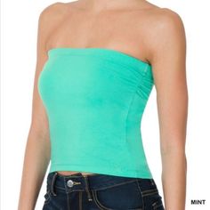 Cotton Crop Top Tube Top With Built-In Bra Fabric: 95% Cotton, 5% Spandex. The Fabric Has Stretch In It And Hugs Your Body. Total Body Length: 12.25", Bust: 27" - Measured From Small. Add 2" For Each Up Size Available In Sizes Small, Medium, Large And Extra Large Color: Mint. Perfect Cool Color For Summer Crop Top Blue Fitted Bandeau Tank Top, Fitted Blue Bandeau Tank Top, Fitted Seamless Tube Top For Spring, Blue Stretch Crop Top Tube Top, Blue Seamless Bandeau Top, Blue Bandeau Tank Top For Spring, Blue Stretch Bandeau Top, Spring Blue Bandeau Tank Top, Trendy Spring Tube Top