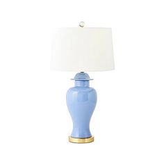 a blue table lamp with a white shade