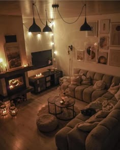 a living room filled with furniture and candles