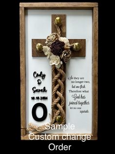 a cross made out of rope and flowers with the words sample custom change order on it