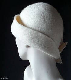 White felt hat, womens hat, Felted Hat, Wedding hat felt hat Cloche Hat Art Hat White Hat La belle epoque Art Deco 1920s hat Art Hats White hat cloche 1920's hat Gatsby hat Mother of the bride Hats&Caps Accessories Handmade Great, very flattering hat ! Adapts to the head ! Special and unique ! Sophisticated and elegant ! My other hats you can find here: https://www.etsy.com/shop/Feltpoint?ref=hdr_shop_menu&section_id=17484098 On order I can make a hat in a different size and color. As th Winter Brimmed Cloche Hat For Church, Brimmed Cloche Hat For Church In Winter, Winter Church Brimmed Cloche Hat, Classic White Hat Bands For Winter, White Fitted Felt Hat With Curved Brim, Winter Wedding Felt Hat With Wide Brim, Classic Felt Cloche Hat, White Brimmed Felt Hat For Winter, Fitted White Cloche Costume Hat