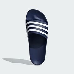 adilette Dark Blue and White Aqua Slides | Free Shipping with adiClub | adidas US Blue Adidas Slides For Beach, Cheap Adidas Non-slip Slides, Adidas Blue Synthetic Slides, Adidas Non-slip Summer Slides, Adidas Non-slip Slides, Adidas Adilette, Blue Clouds, Blue Adidas, Adidas Online