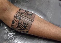 a man with a tattoo on his arm