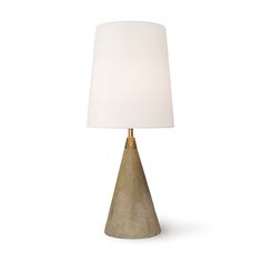 a table lamp with a white shade on it's base and a gold metal base