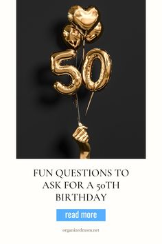 balloons with the number 50 on them are being held in front of a black background