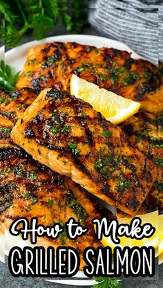 grilled salmon on a plate with lemon wedges and parsley in the background