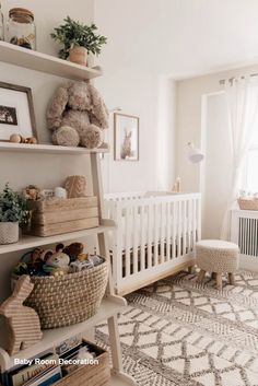 a baby's room with a crib, bookshelf and stuffed animals