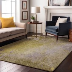 a living room with two couches and a rug on the floor in front of a fireplace