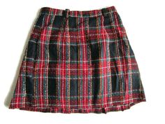 90s Vintage Short Skirt. Ladies Women Checkered Skirt. Tartan Skirt. Red, Black, Green, White Classic Preppy Skirt. Winter Fall Fashion. Size Medium. The pretty skirt has pleats in the front and decorative buttons in black and gold. The skirt is fully lined. The length is a bit above the knee. A very nice item for Fall, Winter season. Sits on the true waist. Condition- very nice vintage. Material- woven, a bit textured material- possibly wool blend, lining- polyester. Size estimate- a smaller Me Retro Red Skirt For Fall, Red Mini Skirt For School In Winter, Red Lined Skirt For School, Retro Red Skort, Winter Retro Mini Skirt, Retro Red Bottoms For School, Red Mini Length Bottoms For School, Red Mini Bottoms For School, Red Retro Mini Skirt Skort