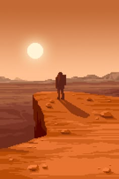 two people walking across a desert landscape at sunset