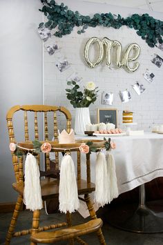 the table is decorated with flowers and decorations for an elegant birthday or bridal party