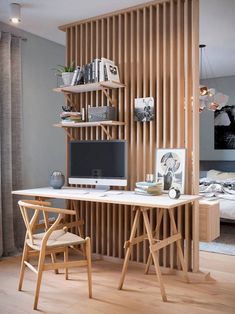 an office with wooden slats on the wall