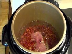 the meat is being cooked in the pot on the stove