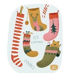 an illustration of christmas socks and boots with the words it's coming