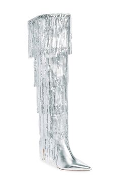 Cascading tiers of sequin fringe bring the dazzle of a disco ball to a glamorous metallic boot lifted by a sleek stiletto and finished with a sharp pointy toe. 3" heel 23" shaft; 18" calf circumference Pull-on style Synthetic upper, lining and sole Imported Asian & Pacific Islander Owned/Founded Sequin Boots, Metallic Boots, Azalea Wang, Chunky Heels Boots, Fringe Boots, Pointed Toe Heels, Long Boots, Thigh High Boots, Stiletto Heel