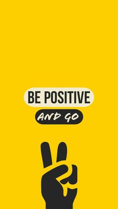 a yellow poster with the words be positive and go above it is a hand making a peace