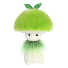 a stuffed animal with a green hat on it's head and fur tail, sitting in front of a white background