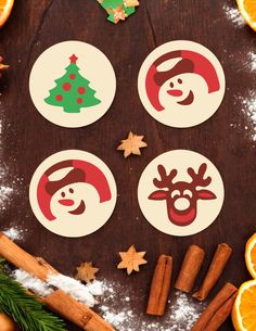 orange slices and cinnamon sticks with christmas stickers on them