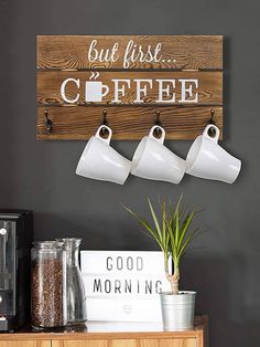 coffee mugs are hanging on the wall