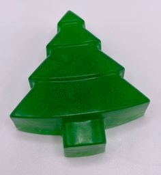 Our Christmas Tree soap has mild citrus top notes, earthy undercurrents, and a woody, fir balsam core that makes you think “Christmastime.” Cozy and comforting, our Christmas Tree soap is perfect for setting a festive holiday mood. This soap is infused with natural essential oils, including fir balsam. Christmas Essential Oil Soap Blends, Christmas Soap Bar Ideas, Grinch Soap, Christmas Soap Target, Holiday Soap, Soap Carving, Holiday Mood, Simple Christmas Tree, Festive Holiday